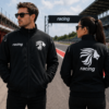 Black racing jacket with lion logo front and back view worn by man and woman on racetrack motorsport style jacket